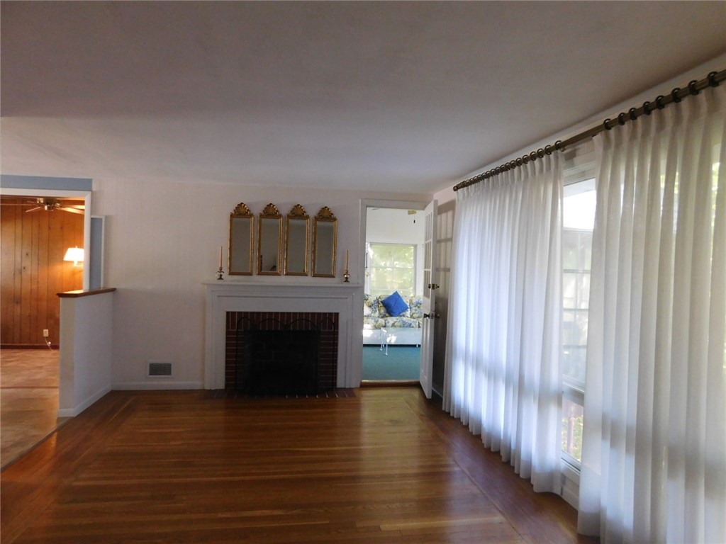 2 Deborah Road Warwick, RI 02888 - Photo 23 of 44 Huge living room space, w/ fireplace.