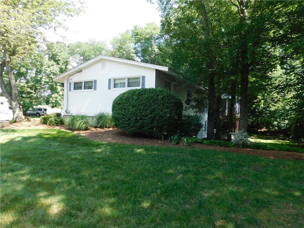 2 Deborah Road Warwick, RI 02888 - Photo 7 of 44 Irrigation system provide s lush green grass.