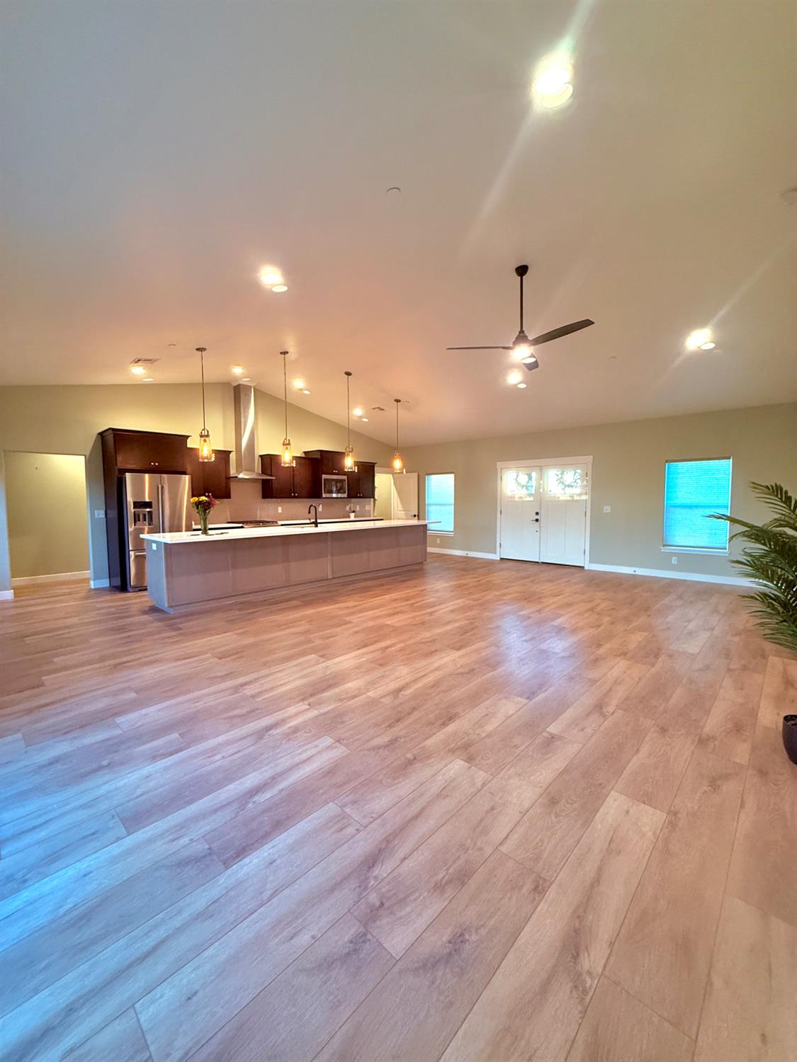 3696 Neal Road Paradise, CA 95969 - Photo 4 of 26 a view of a room with kitchen island microwave and wooden floor