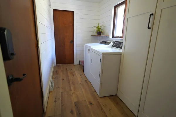 a utility room with a window dryer and washer