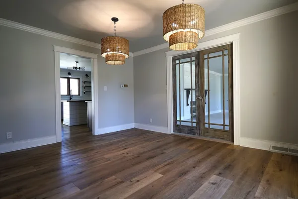 a view of a livingroom with wooden floor