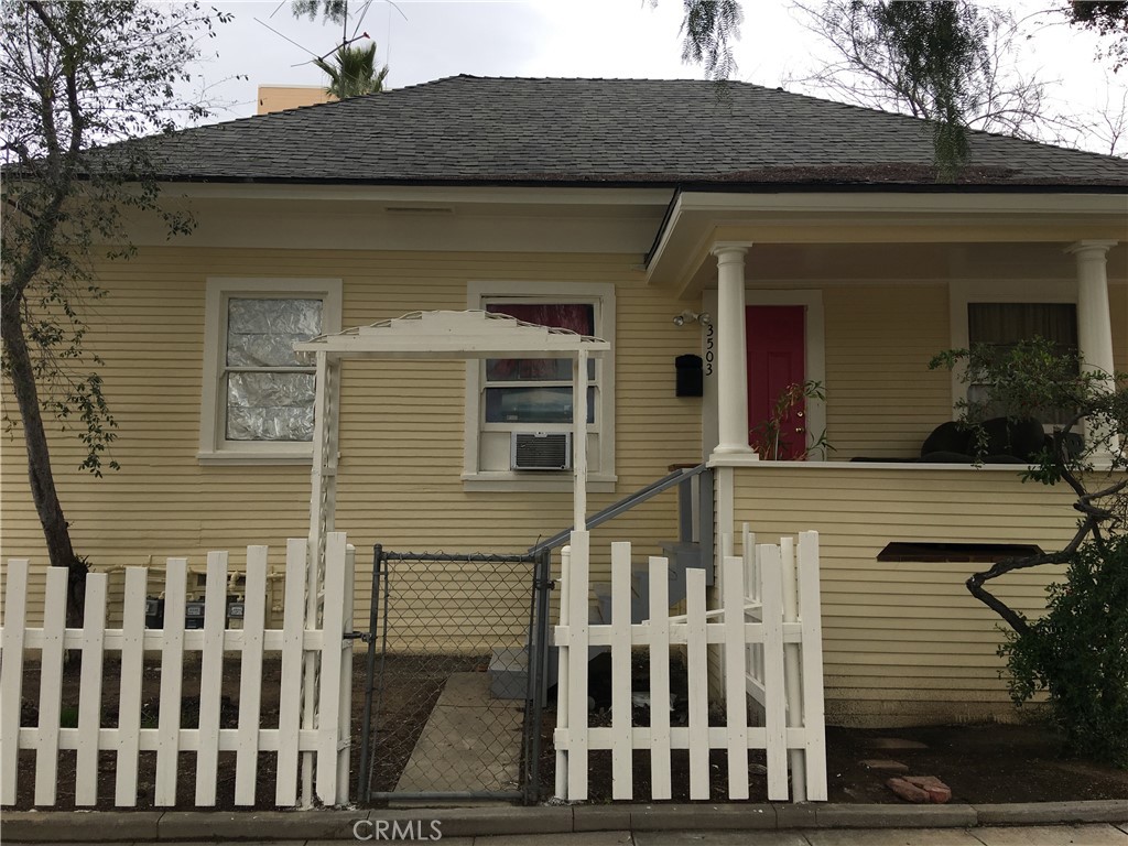 3499 Lemon Street Riverside, CA 92501 - Photo 4 of 32 a view of a house with a small yard