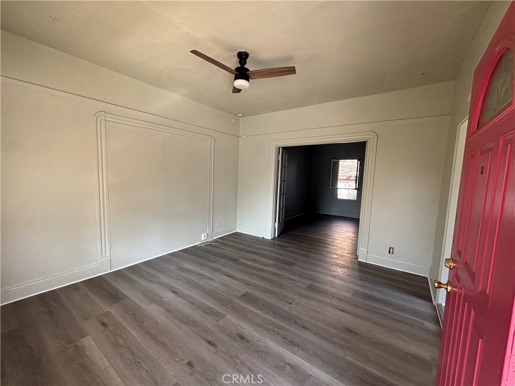 3499 Lemon Street Riverside, CA 92501 - Photo 9 of 32 wooden floor in an empty room with a window