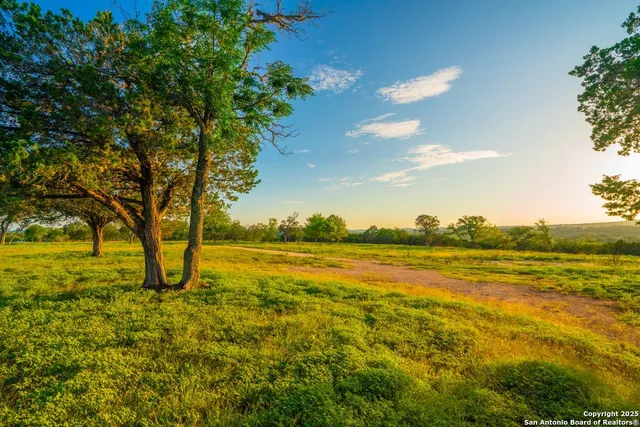 a view of an ocean from a mountain