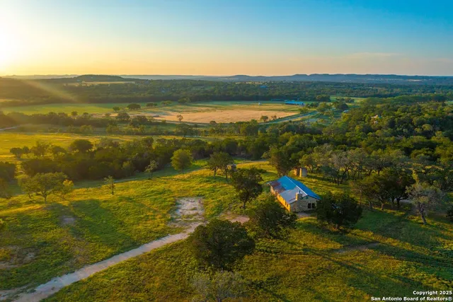 a view of an ocean and mountain