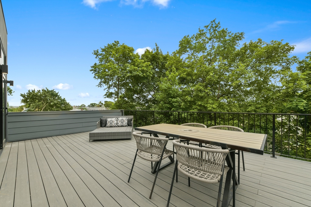 23 Eastman Road Somerville, MA 02143 - Photo 18 of 18 a view of house with terrace outdoor seating