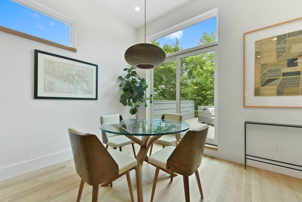 23 Eastman Road Somerville, MA 02143 - Photo 2 of 18 a dining room with furniture and window
