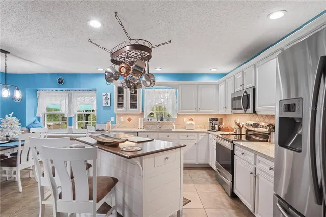 $650,000 | 14204 Highgrove Road, Spring Hill, FL 34609