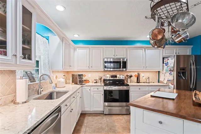 $650,000 | 14204 Highgrove Road, Spring Hill, FL 34609