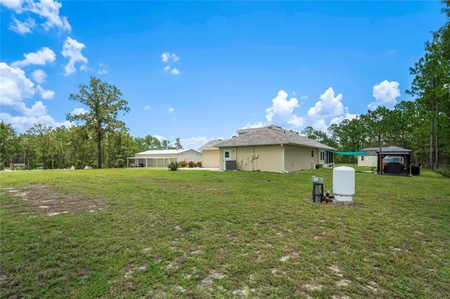 $650,000 | 14204 Highgrove Road, Spring Hill, FL 34609