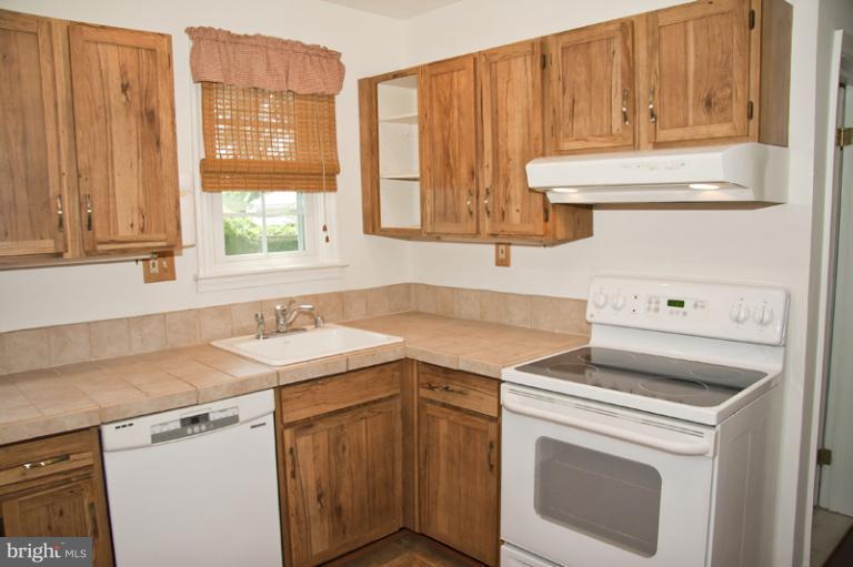 703 Sudbrook Road Pikesville, MD 21208 - Photo 13 of 15 a utility room with dryer and washer