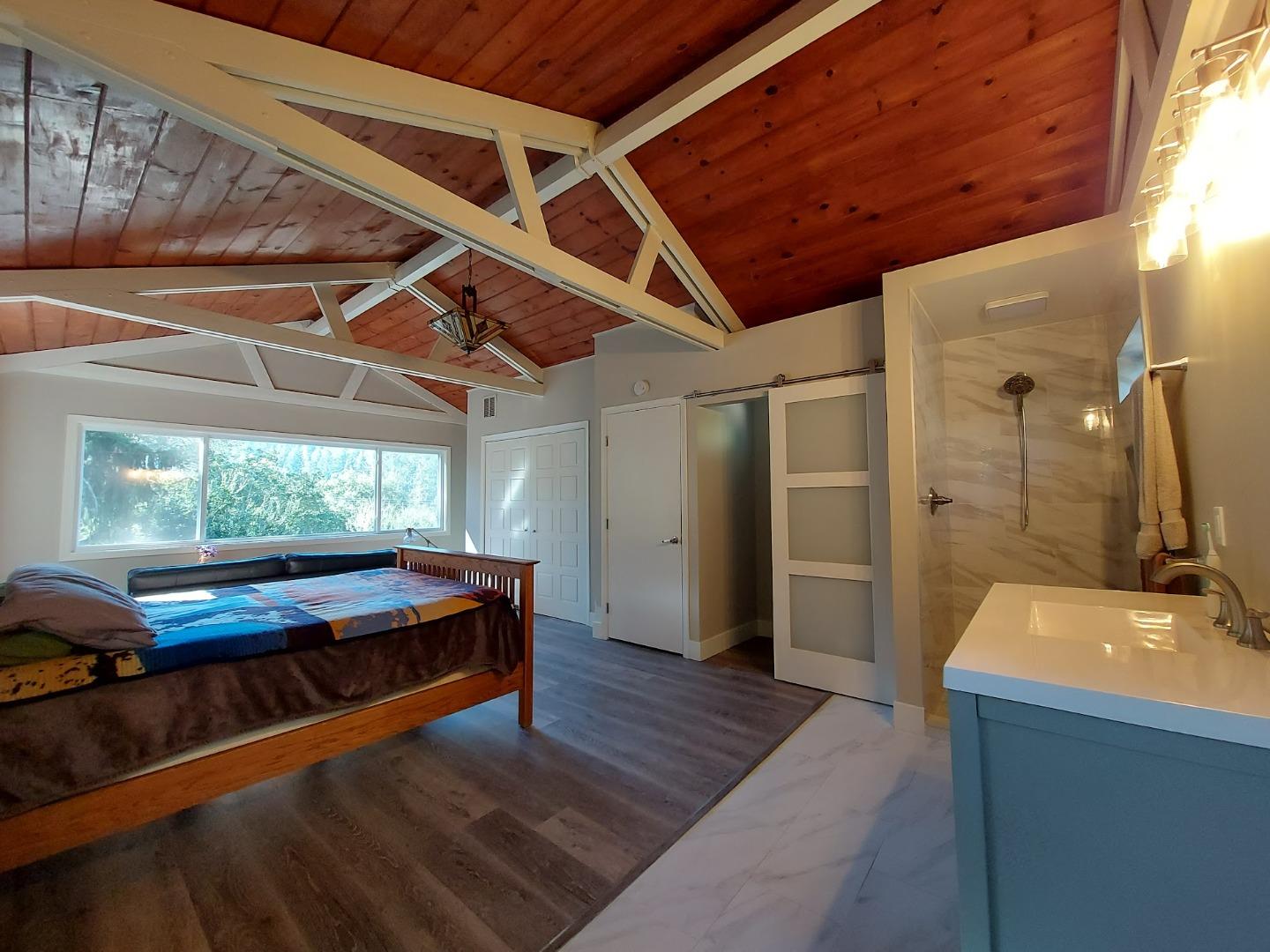 21390 Aldercroft Heights Road Los Gatos, CA 95033 - Photo 13 of 23 a living room with stainless steel appliances granite countertop furniture and a fireplace