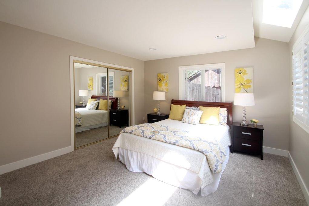 21390 Aldercroft Heights Road Los Gatos, CA 95033 - Photo 15 of 23 a bedroom with a bed and a couch