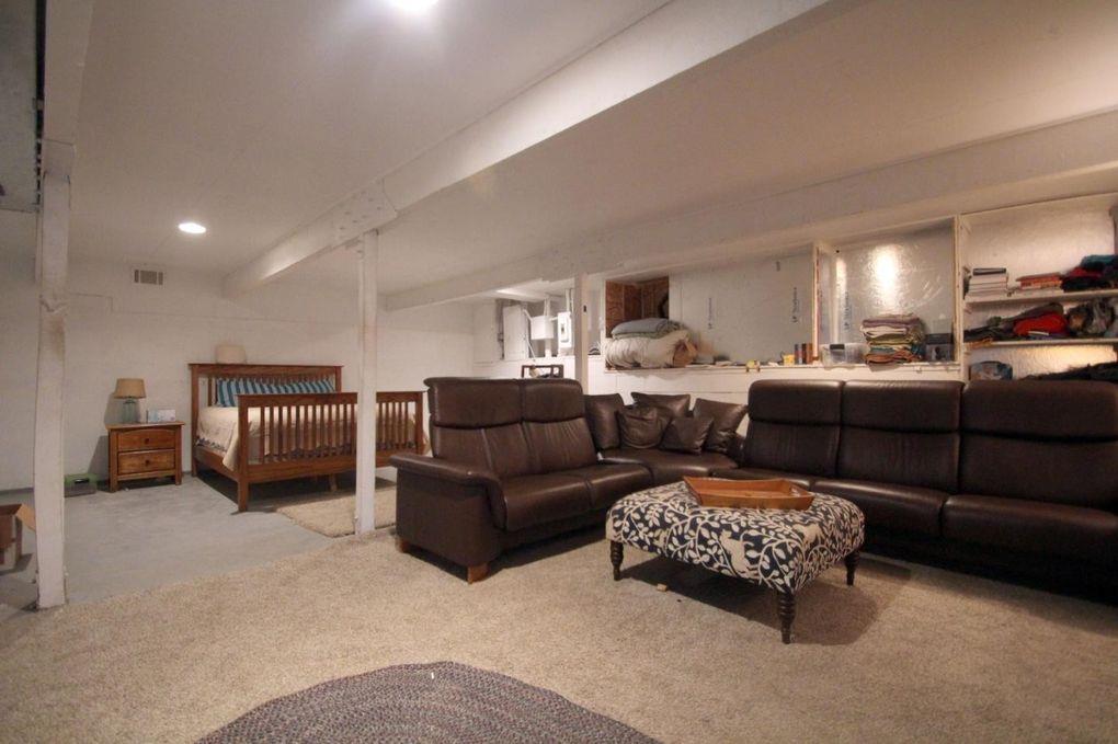 21390 Aldercroft Heights Road Los Gatos, CA 95033 - Photo 16 of 23 a living room with furniture and a couch