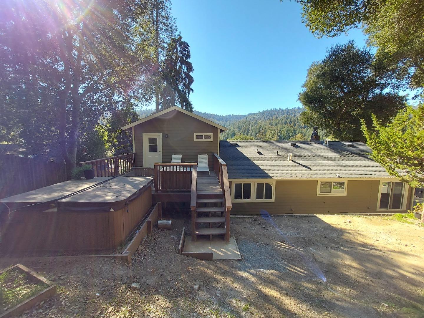 21390 Aldercroft Heights Road Los Gatos, CA 95033 - Photo 20 of 23 a front view of a house with a yard