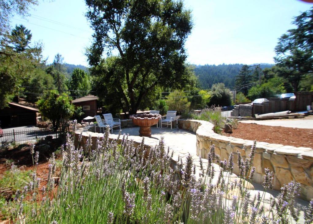21390 Aldercroft Heights Road Los Gatos, CA 95033 - Photo 3 of 23 a view of swimming pool with lawn chairs and plants