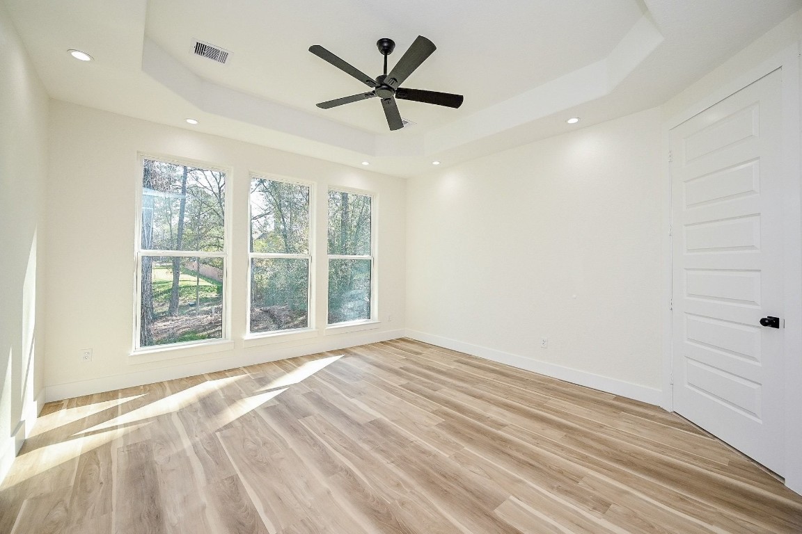 21614 Lee Road Humble, TX 77338 - Photo 22 of 36 a view of an empty room with a window