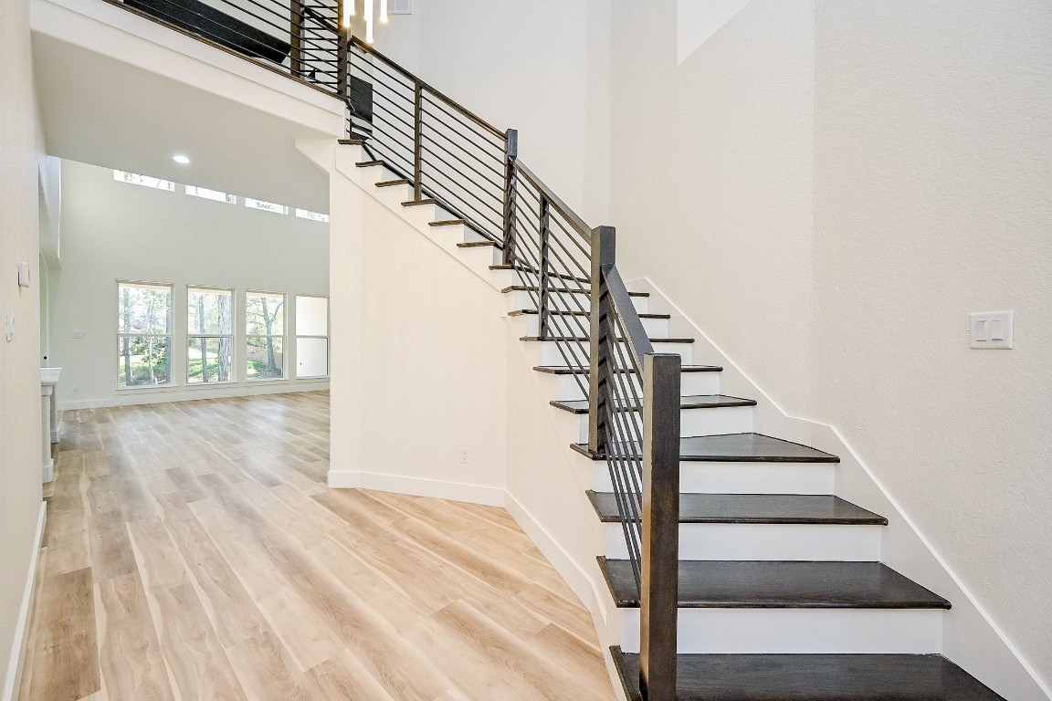 21614 Lee Road Humble, TX 77338 - Photo 3 of 36 a view of entryway and hall with wooden floor