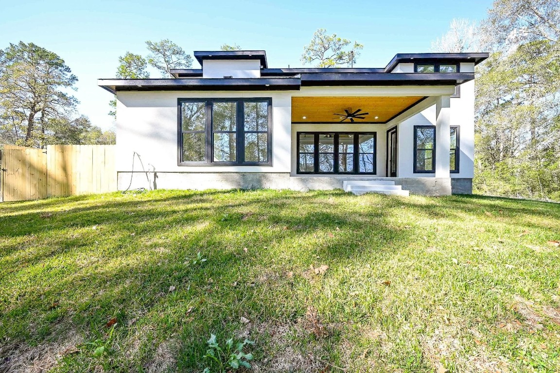 21614 Lee Road Humble, TX 77338 - Photo 31 of 36 a view of a house with pool and a yard