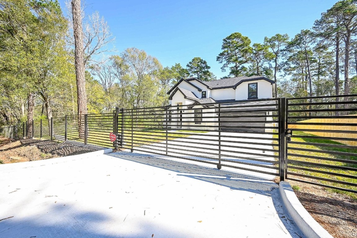 21614 Lee Road Humble, TX 77338 - Photo 33 of 36 a view of a back yard of the house
