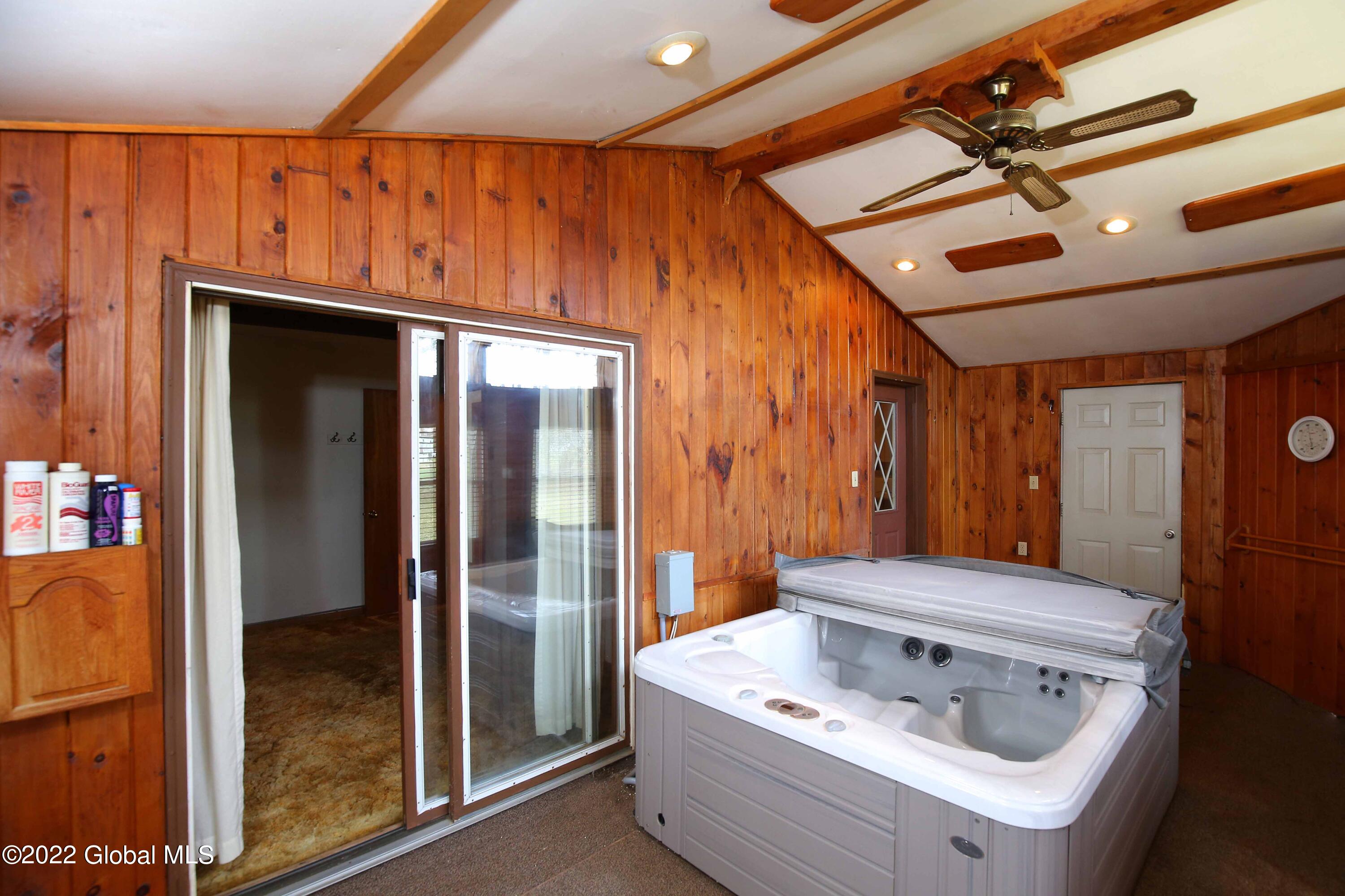 196 Priddle Point Road Gloversville, NY 12078 - Photo 21 of 31 backroom with jacuzzi