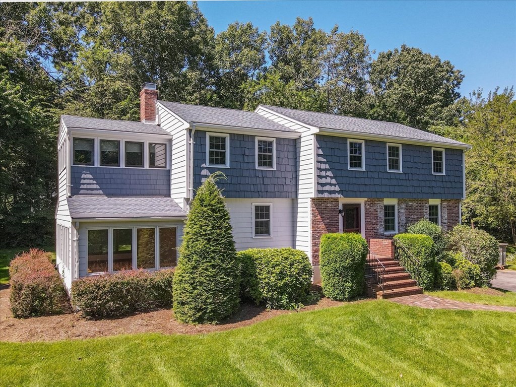44 Ellis Street Medway, MA 02053 - Photo 2 of 42 a front view of a house with a yard