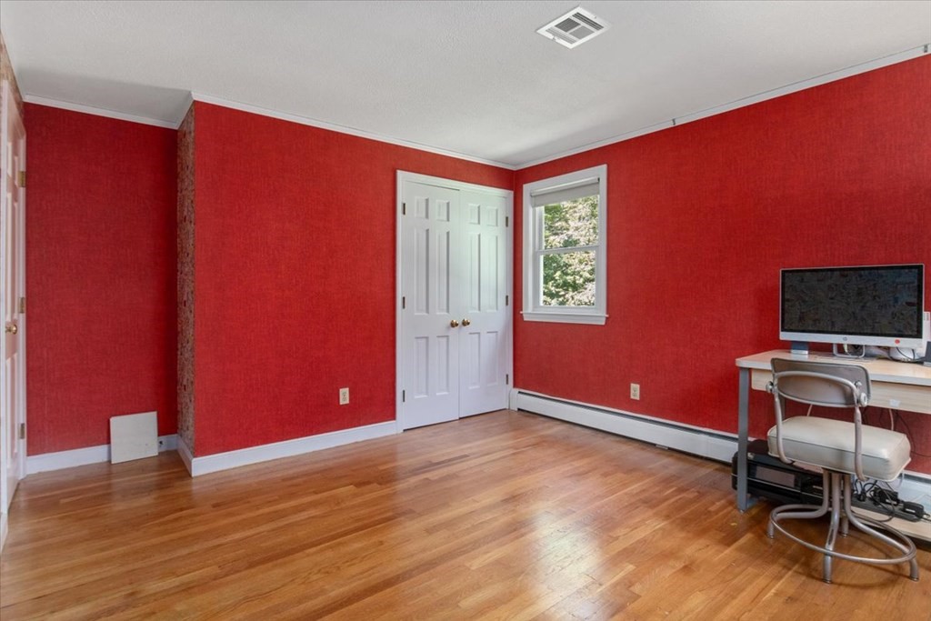 44 Ellis Street Medway, MA 02053 - Photo 27 of 42 a workspace with furniture and wooden floor