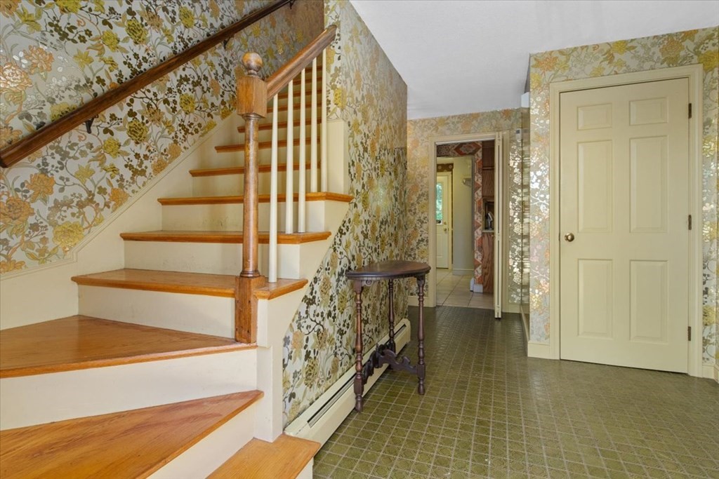 44 Ellis Street Medway, MA 02053 - Photo 3 of 42 a view of entryway with wooden floor and stairs