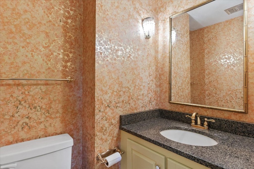 44 Ellis Street Medway, MA 02053 - Photo 32 of 42 a bathroom with a granite countertop sink and a mirror