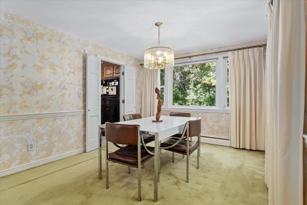 44 Ellis Street Medway, MA 02053 - Photo 8 of 42 a view of a dining room with furniture window and outside view