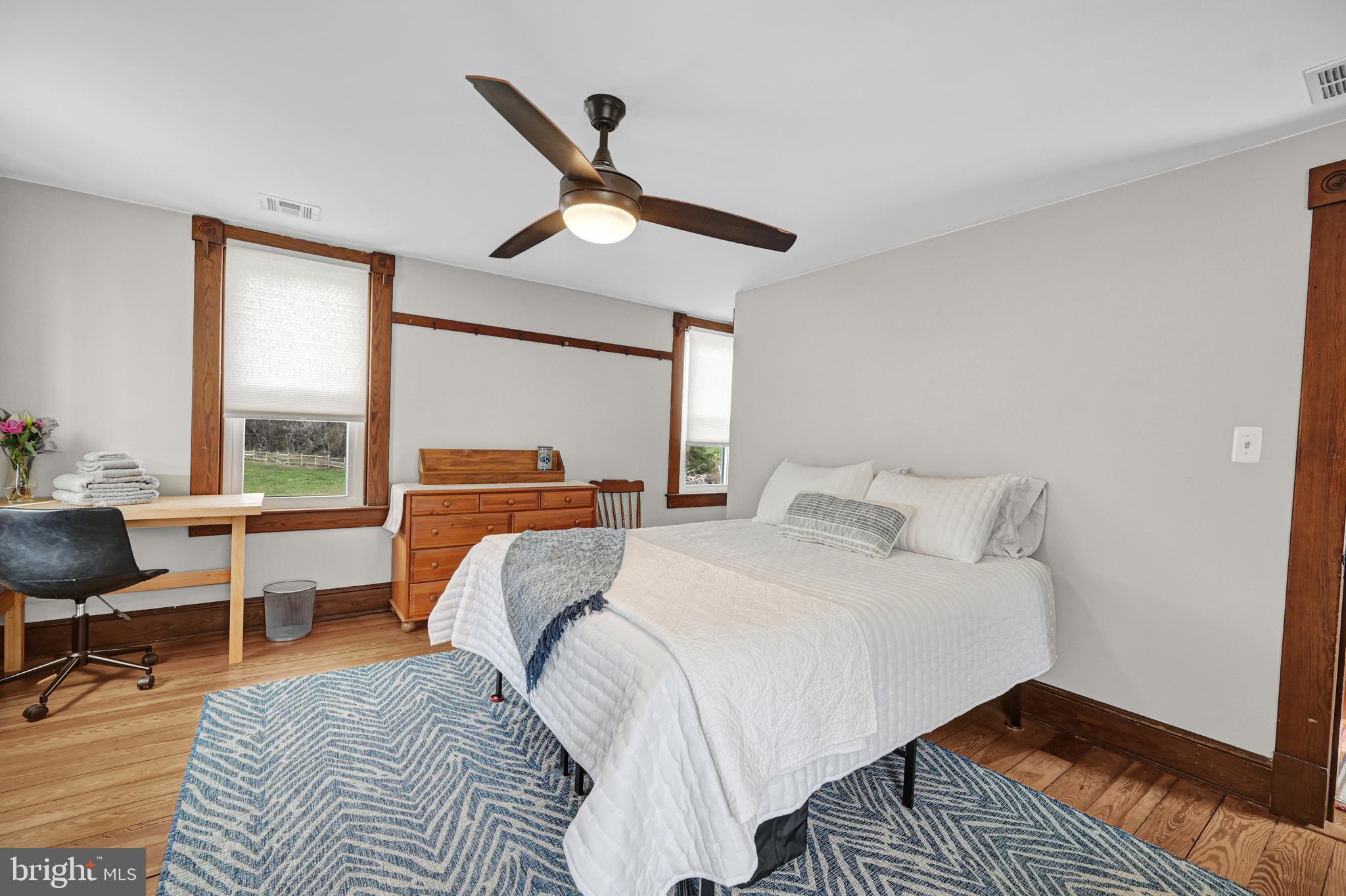 4207 Beckleysville Road Hampstead, MD 21074 - Photo 39 of 68 a bedroom with a bed and a large window
