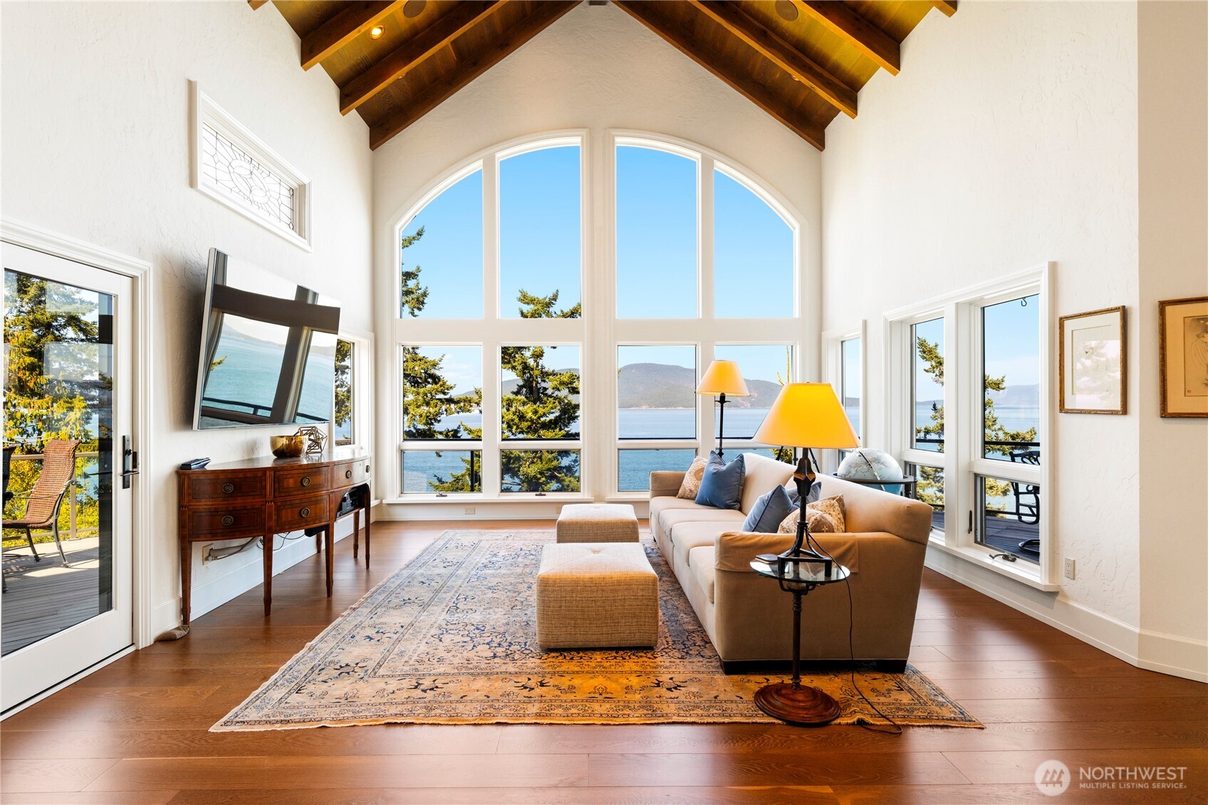 4002 Oakes Avenue Anacortes, WA 98221 - Photo 14 of 38 a living room with furniture fireplace and a flat screen tv