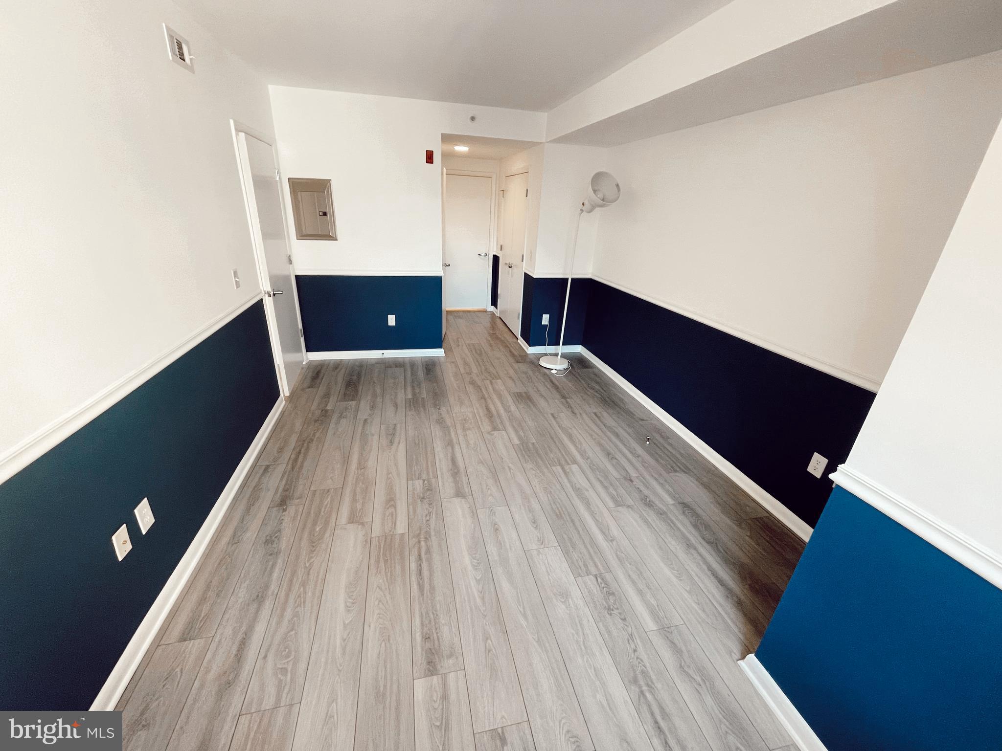 350 G Street Southwest, Unit N501 Washington, DC 20024 - Photo 11 of 49 a view of empty room with wooden floor