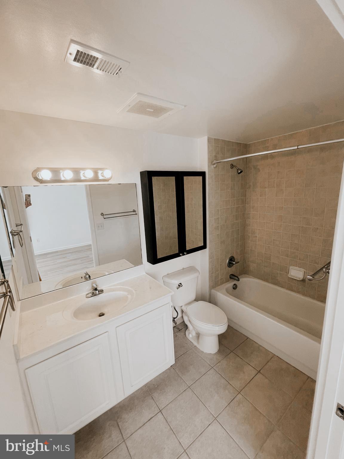 350 G Street Southwest, Unit N501 Washington, DC 20024 - Photo 38 of 49 a bathroom with a sink toilet and shower