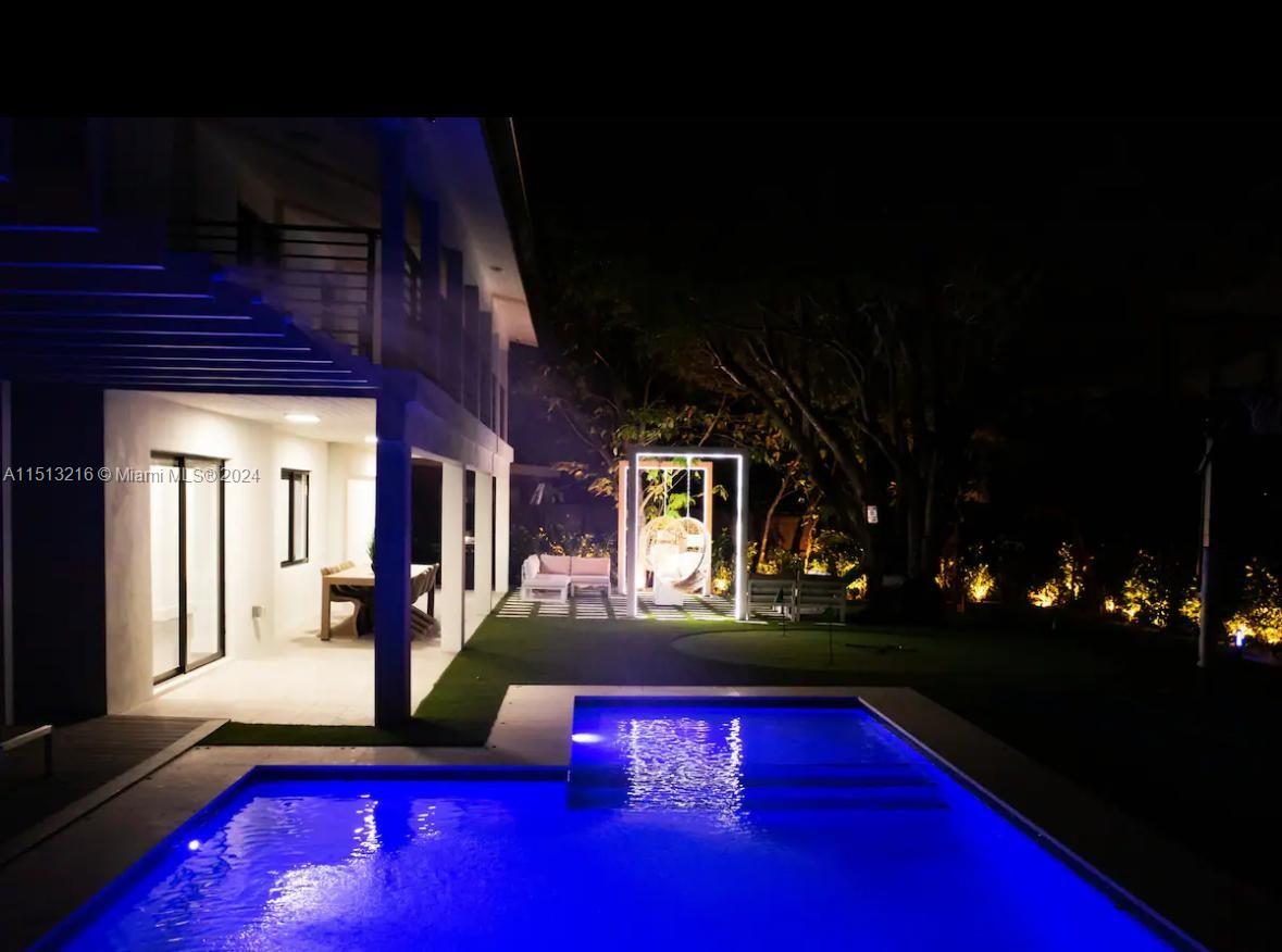 4021 Southwest 124th Court Miami, FL 33175 - Photo 4 of 8 a living room with yard pool table and chairs
