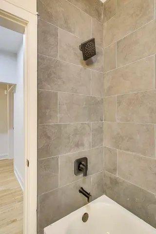 a bathroom with a sink and a shower