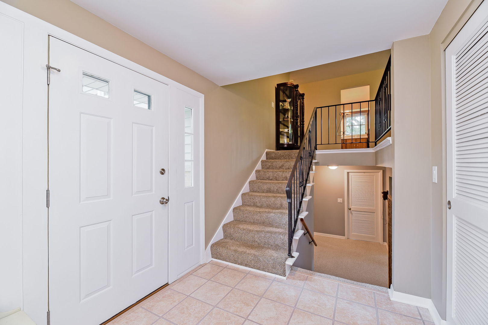 N150 County Farm Road Winfield, IL 60190 - Photo 2 of 22 a view of entryway and hall with wooden floor