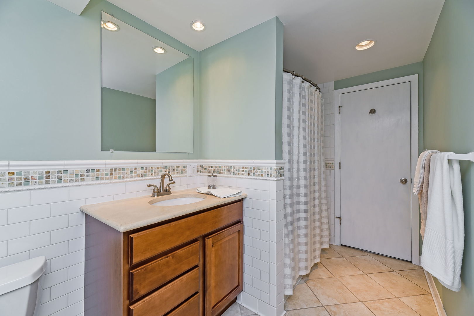 N150 County Farm Road Winfield, IL 60190 - Photo 14 of 22 a bathroom with a sink a toilet and shower