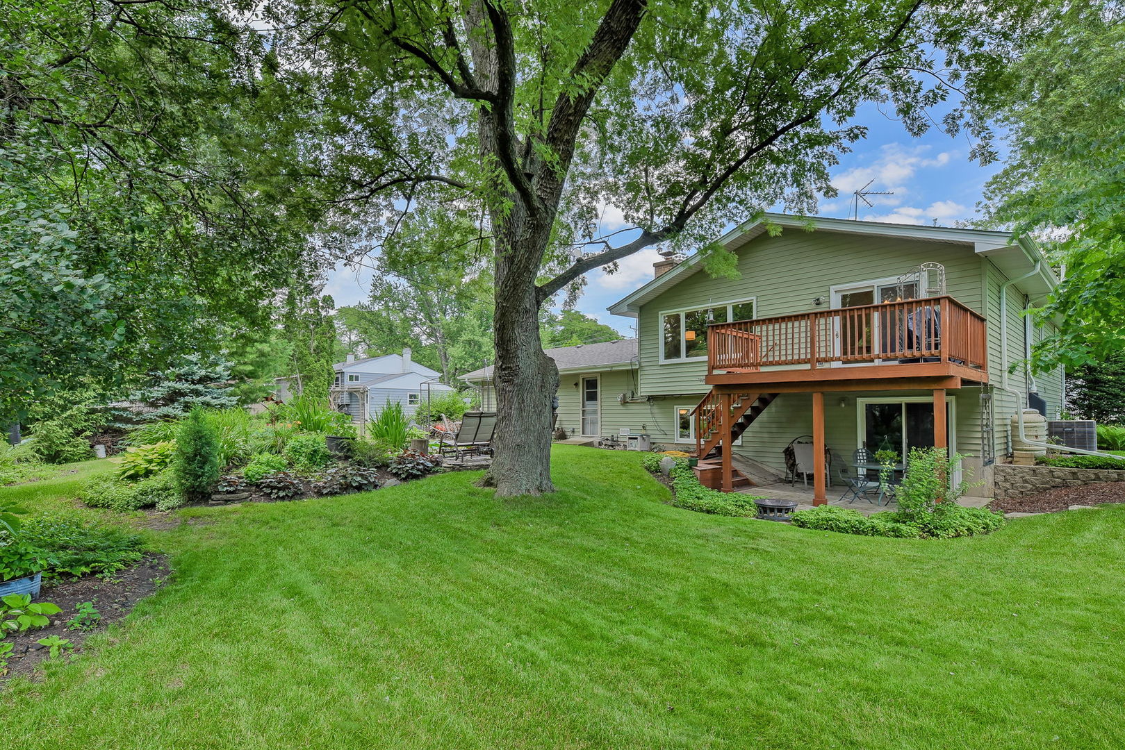 N150 County Farm Road Winfield, IL 60190 - Photo 17 of 22 a view of a house with a yard balcony and sitting area