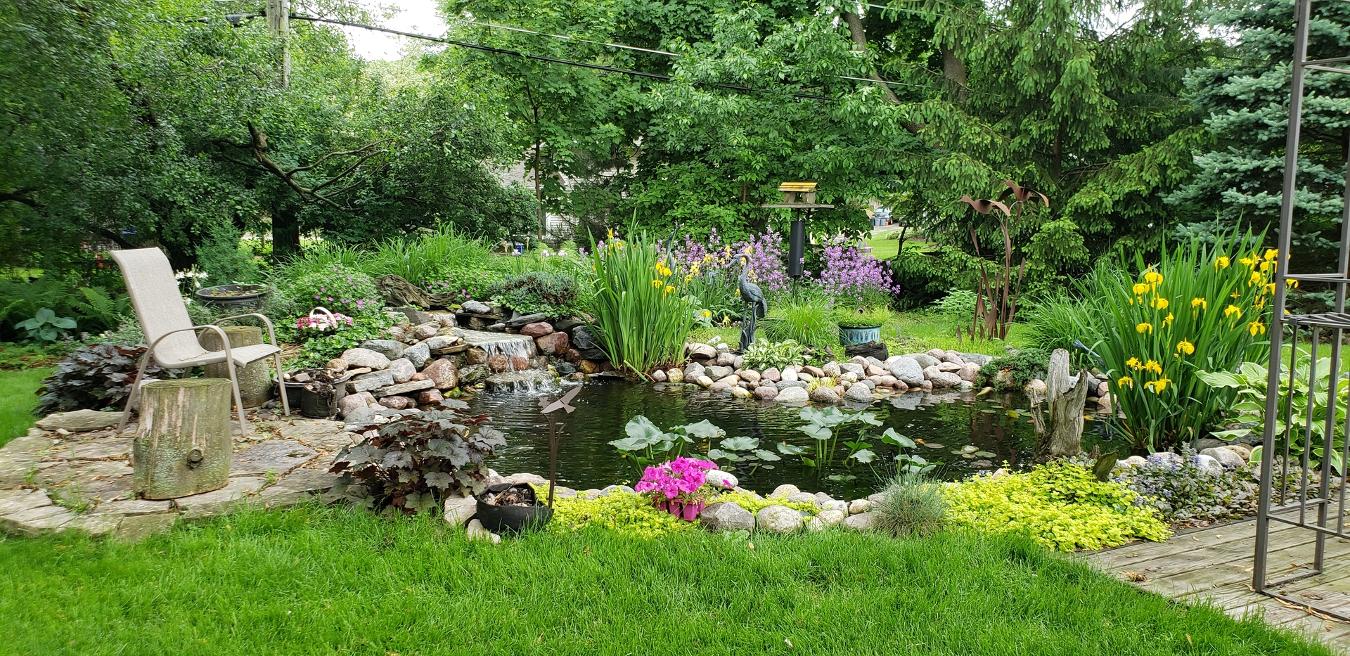 N150 County Farm Road Winfield, IL 60190 - Photo 22 of 22 a view of yard with small fountain and wooden fence