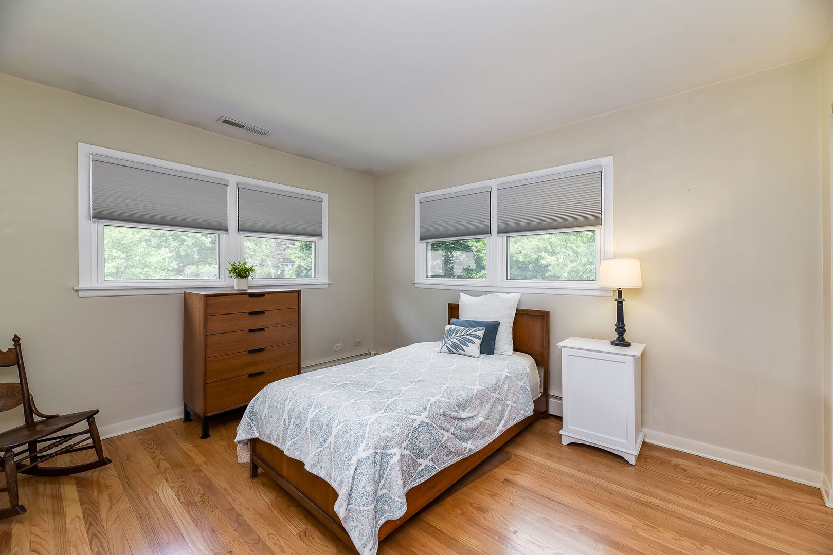 N150 County Farm Road Winfield, IL 60190 - Photo 9 of 22 a bedroom with a bed and a window