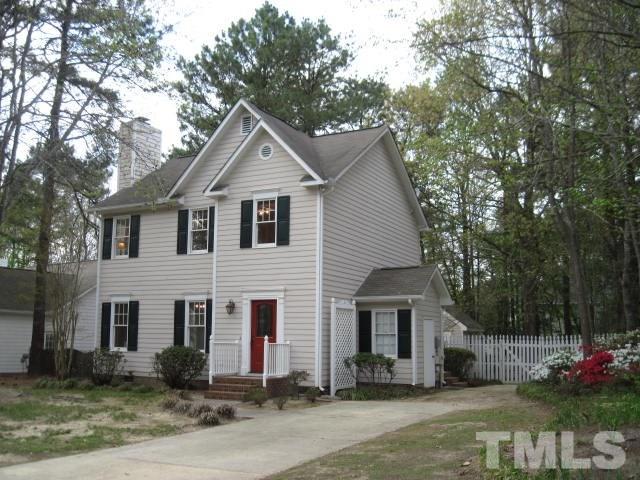 3537 Singleleaf Lane Raleigh, NC 27616 - Photo 1 of 21 a front view of a house with a yard and garage