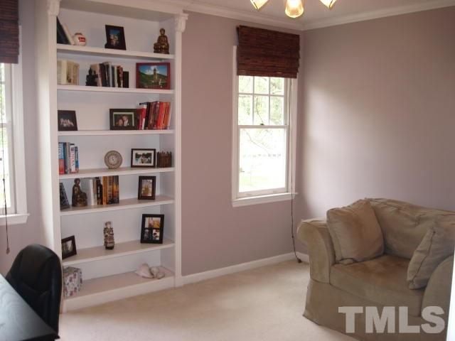 3537 Singleleaf Lane Raleigh, NC 27616 - Photo 14 of 21 a living room with furniture and a window