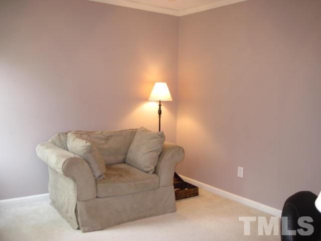 3537 Singleleaf Lane Raleigh, NC 27616 - Photo 15 of 21 a living room with furniture and a lamp