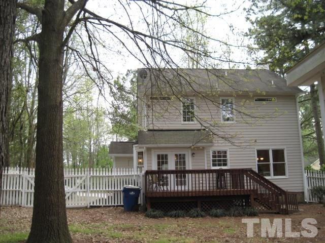 3537 Singleleaf Lane Raleigh, NC 27616 - Photo 18 of 21 a view of a house with a wooden deck