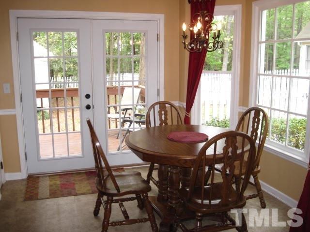 3537 Singleleaf Lane Raleigh, NC 27616 - Photo 5 of 21 a view of a dining room with furniture window and outside view