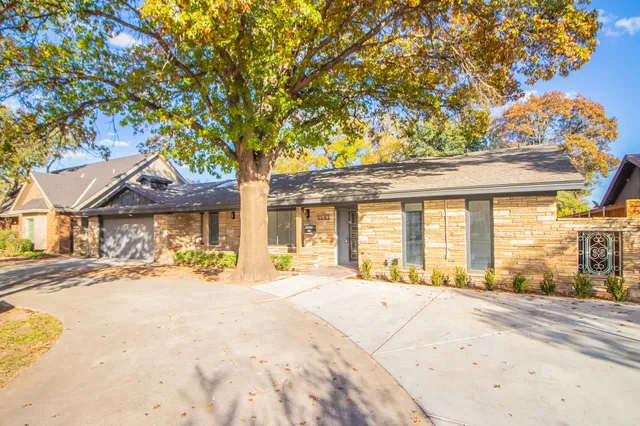 a front view of a house with a outdoor space
