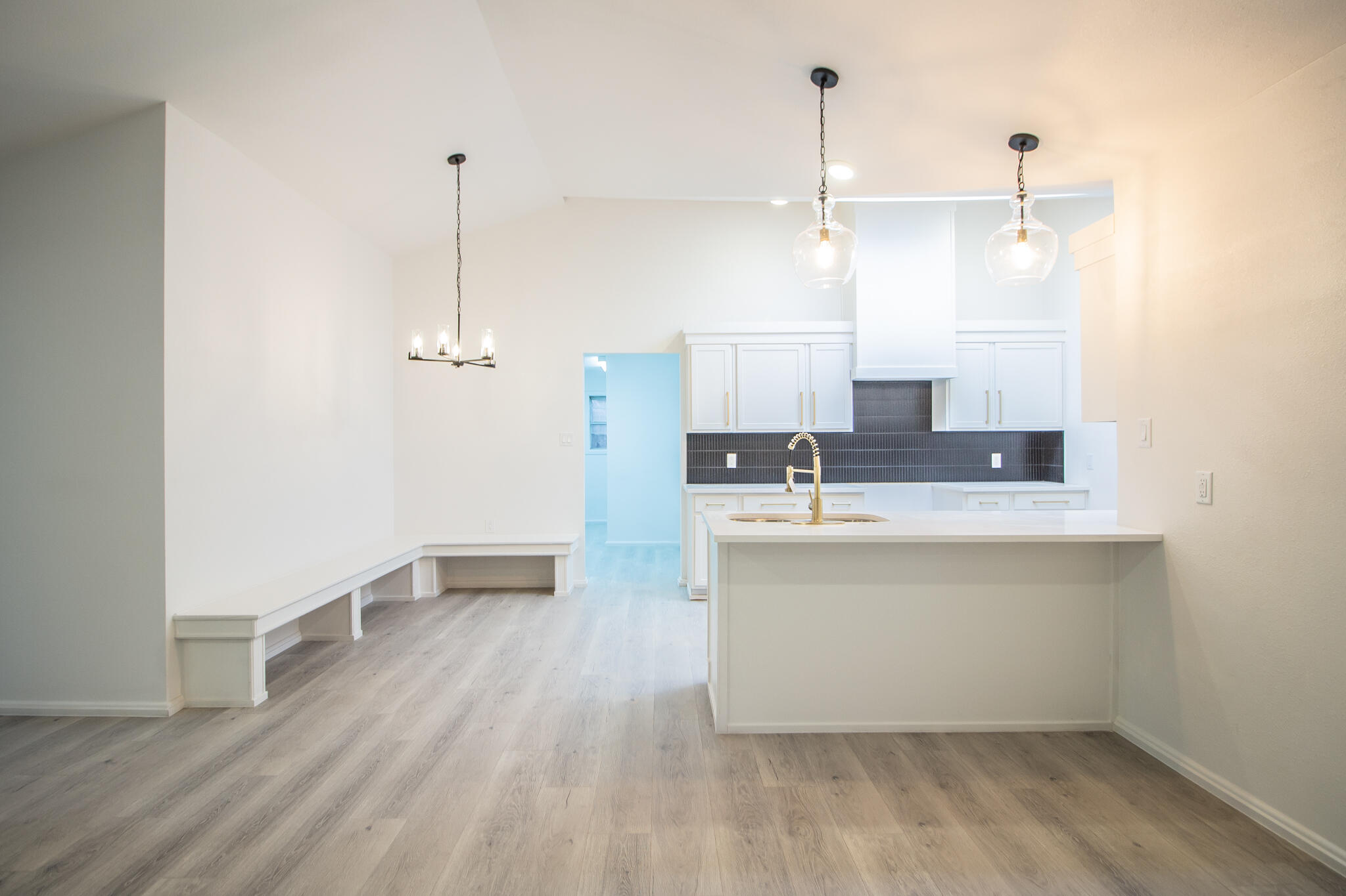 3602 63rd Drive Lubbock, TX 79413 - Photo 11 of 33 a bathroom with a sink a mirror and shower