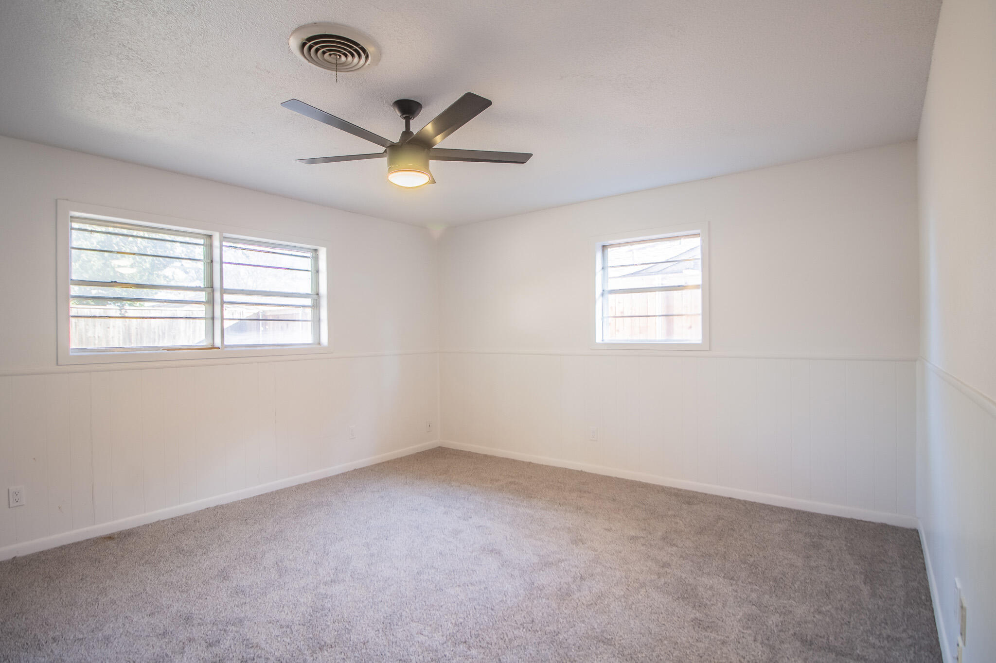 3602 63rd Drive Lubbock, TX 79413 - Photo 25 of 33 a view of an empty room with a window