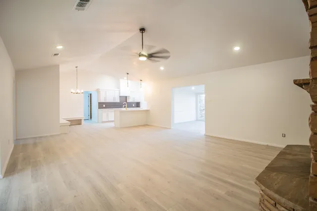 a view of a kitchen with a sink and a dishwasher